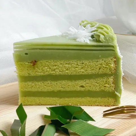 Pandan layer slice cake A slice of pandan layer cake