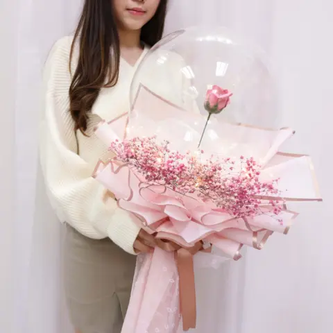 Soap Rose In Da Ball Soap Rose in Dall Ball flower hold by a lady
