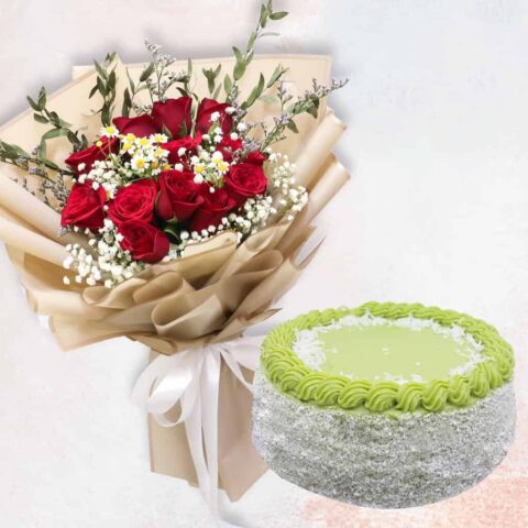 Red rose in golden wrapping and a pandan layer cake