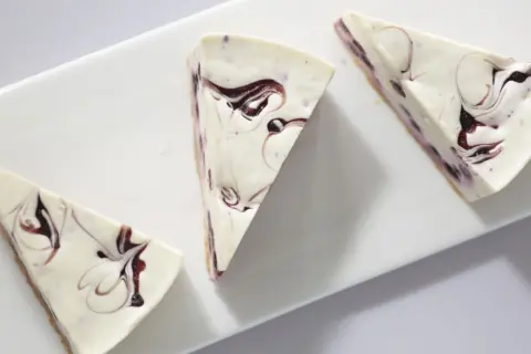 Blueberry White Chocolate Cheesecake Slice Blueberry White Chocolate Cheesecake Slice