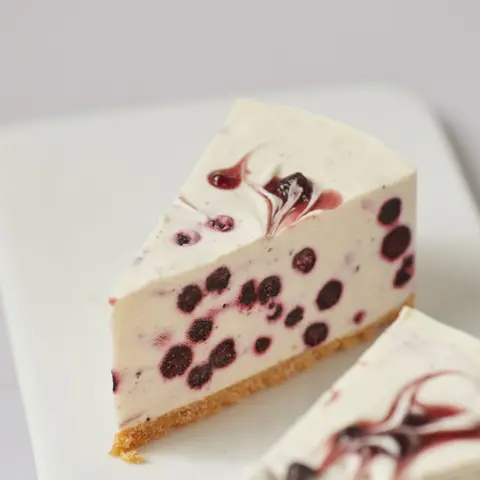 Blueberry White Chocolate Cheesecake (Slice) Blueberry White Chocolate Cheesecake (Slice)