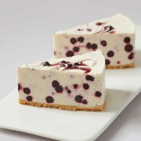 Blueberry White Chocolate Cheesecake (Slice) Blueberry White Chocolate Cheesecake (Slice)